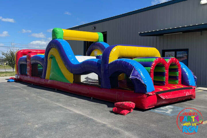 Red and blue inflatable obstacle course in Weslaco